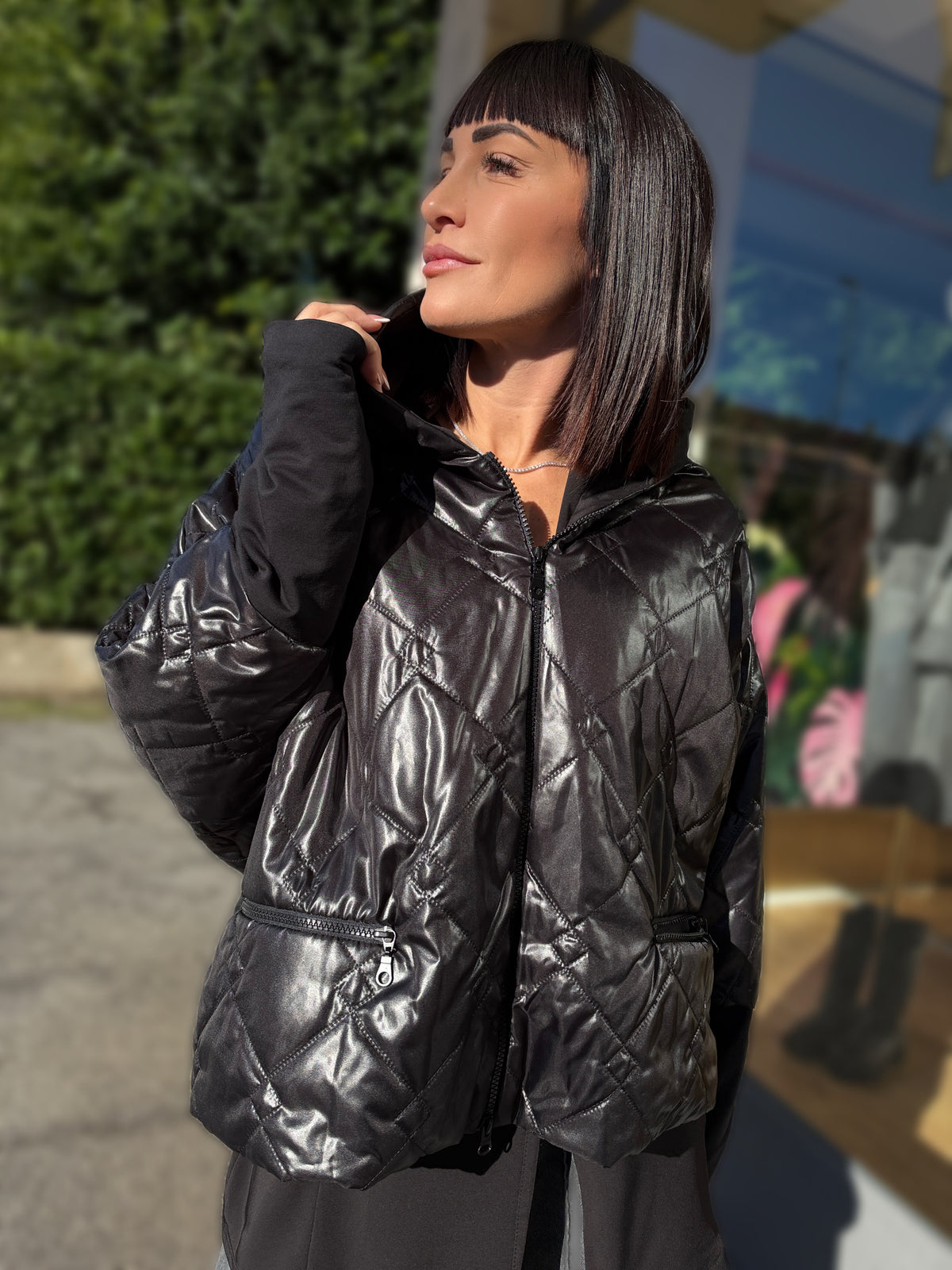 BOMBER OVERSIZE TRAPUNTATO LUCIDO CON MANICHE A CONTRASTO