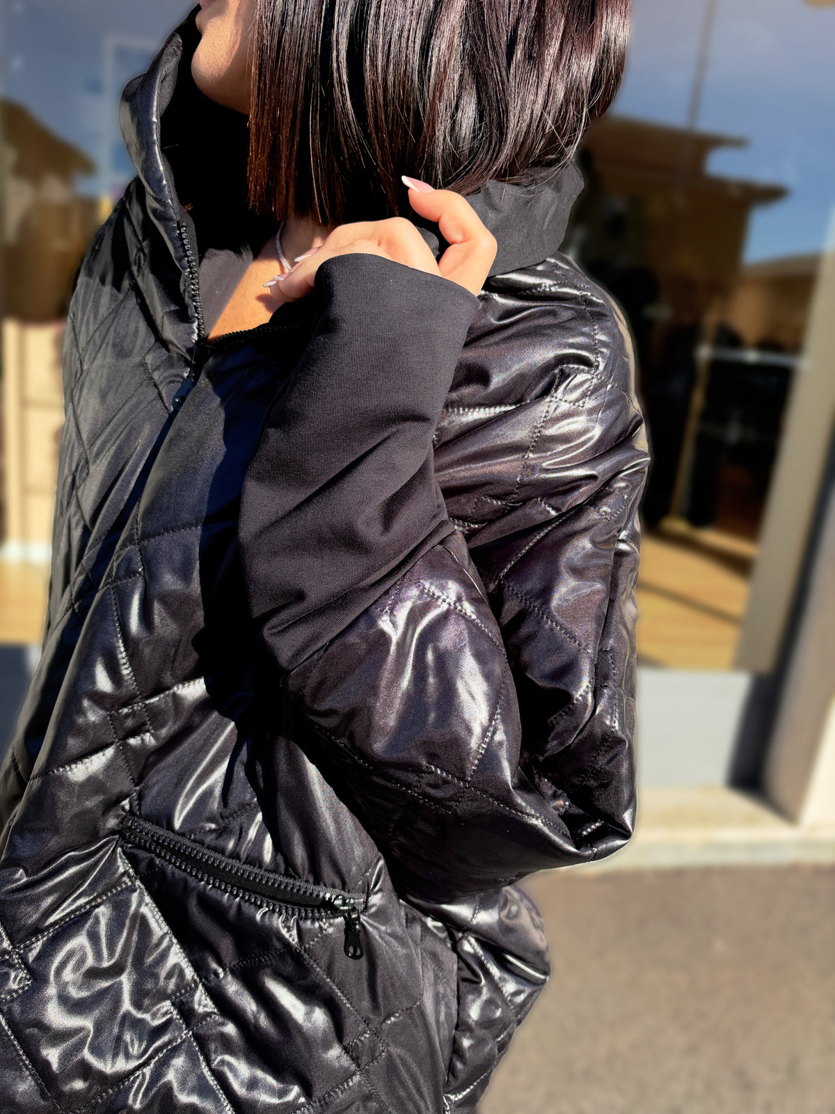 BOMBER OVERSIZE TRAPUNTATO LUCIDO CON MANICHE A CONTRASTO